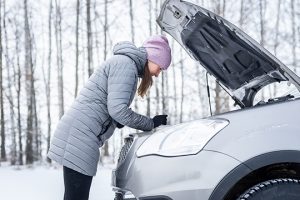 CarRepairOnTheRoadInWinterYoungGirlIs - Meineke Chicago Meineke Car Care | Winter Maintenance | Mundelein